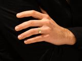 Gold diamond ring on a man's finger, jewelry for men