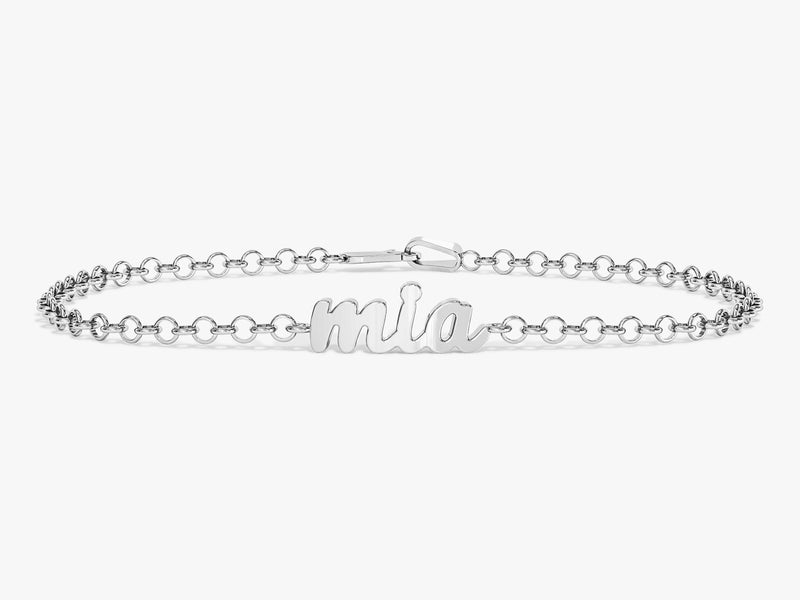 Silver name bracelet with "mia" script for jewelry company