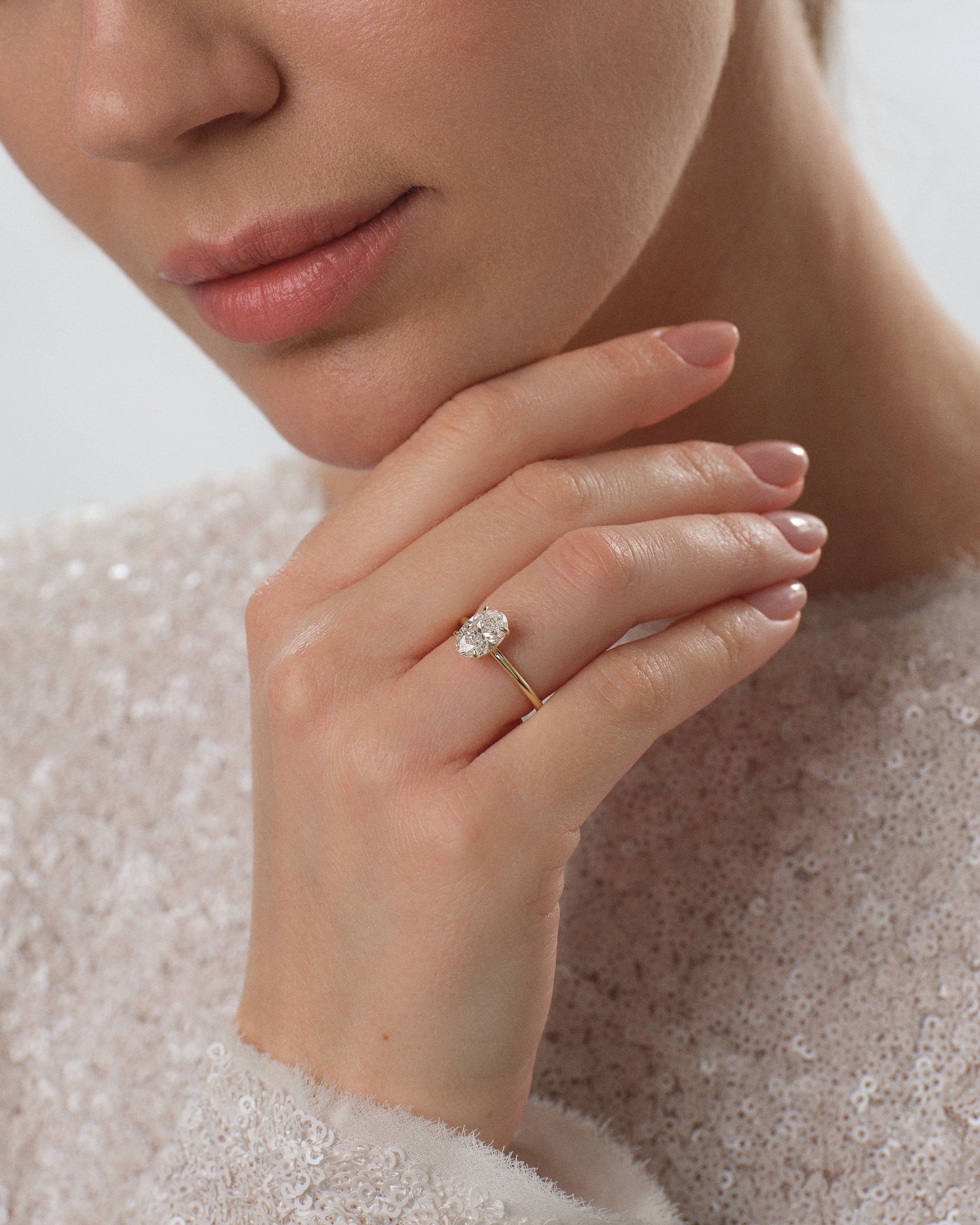 4-Prong Solitaire Oval Cut Moissanite Engagement Ring (1.50 CT)