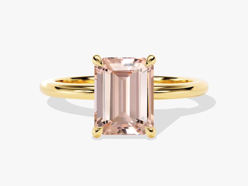 Emerald cut morganite ring in yellow gold setting