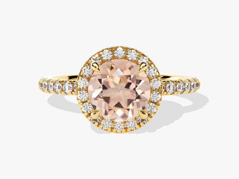 Gold halo ring with peach gemstone and diamonds