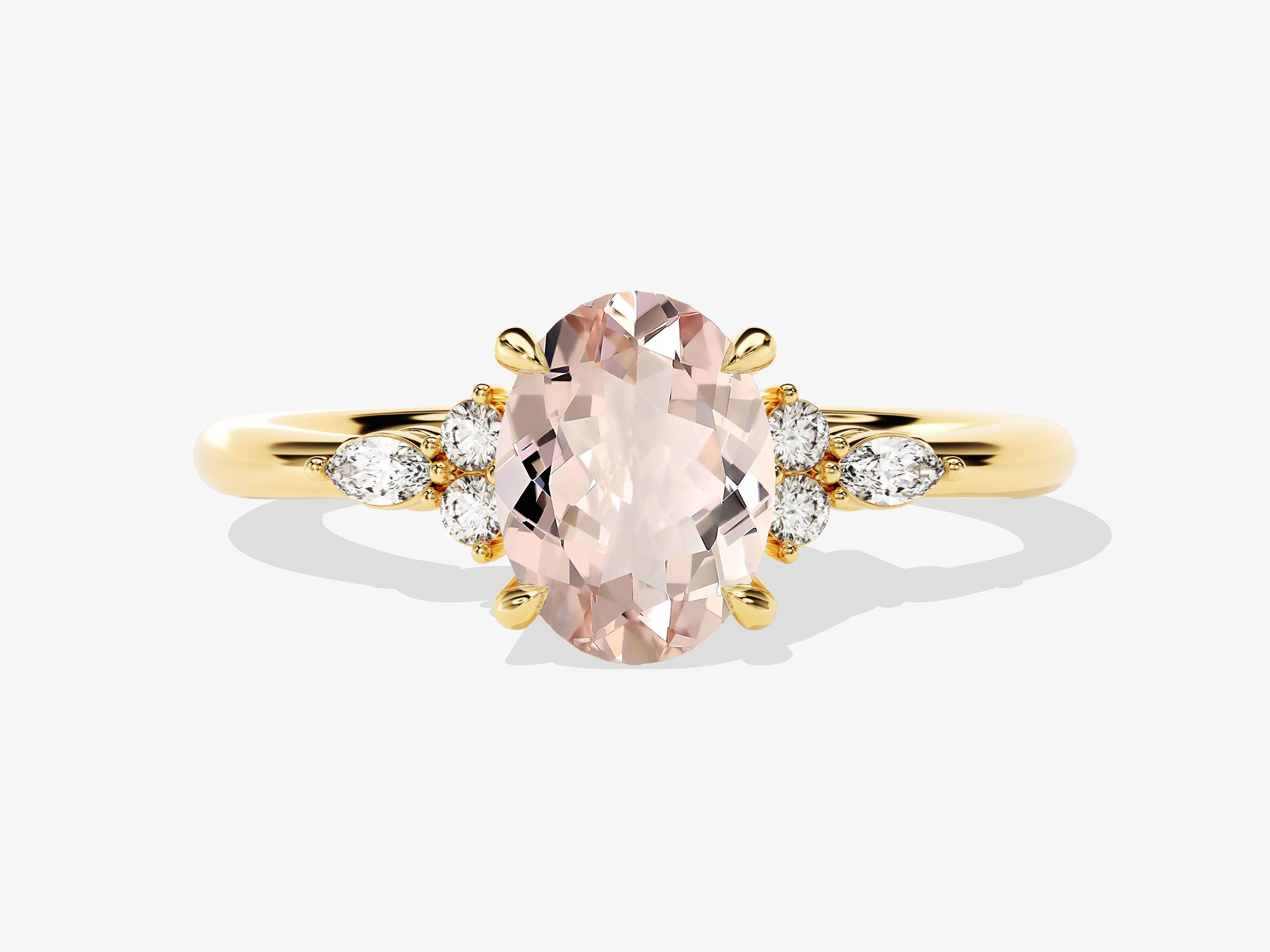 Oval morganite and diamond engagement ring in yellow gold