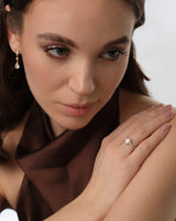 Cluster Accent Oval Cut Moissanite Engagement Ring (1.50 CT)