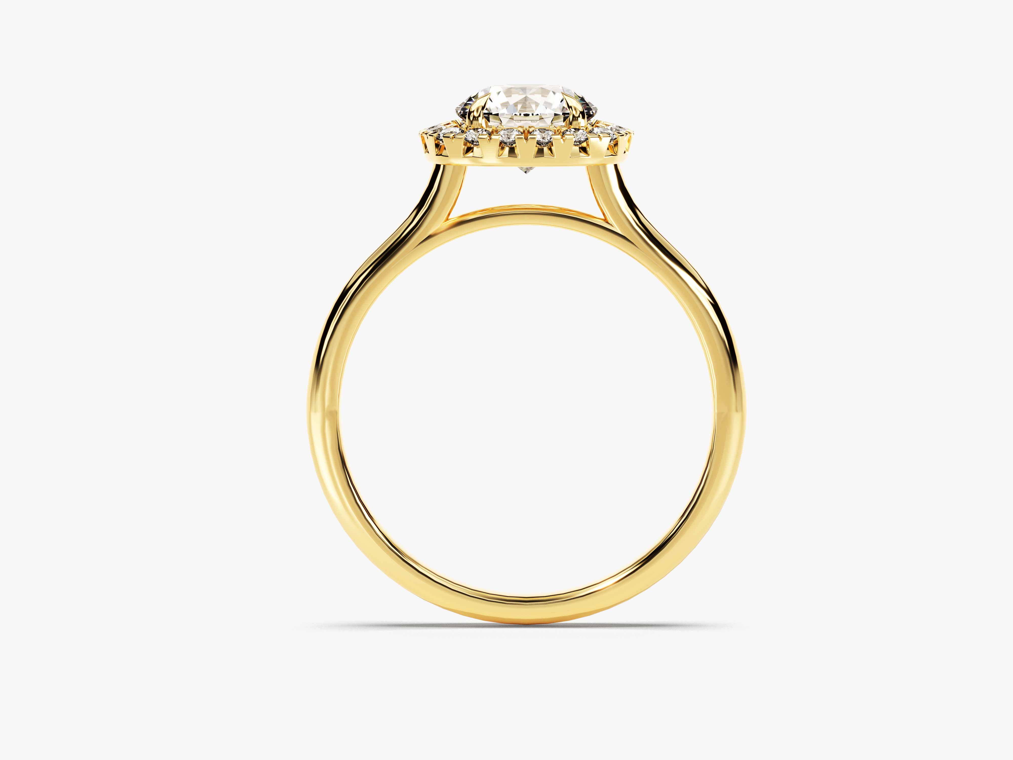 Gold halo engagement ring with diamond center stone