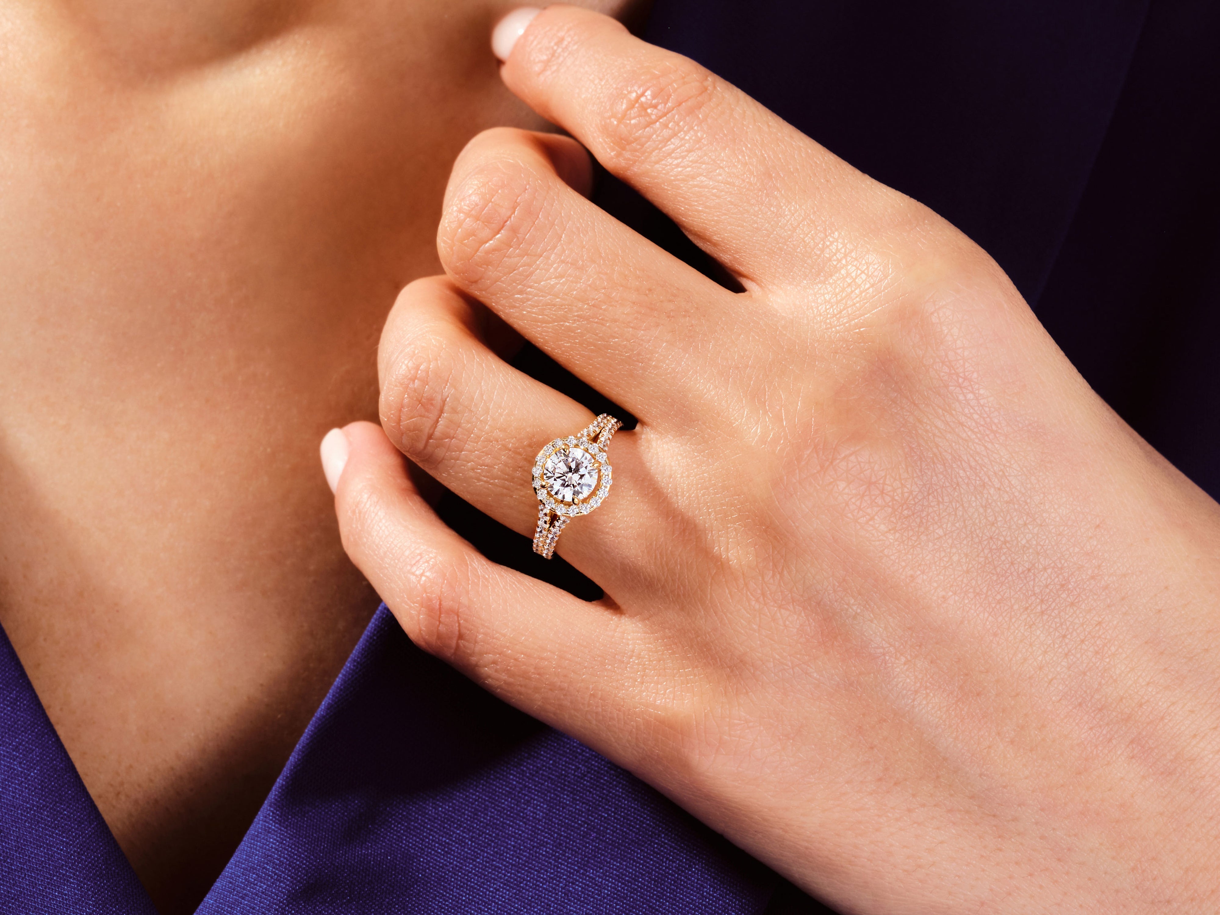 Diamond engagement ring on a woman's hand, jewelry photography