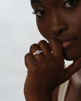 Three Stone Moissanite Engagement Ring with Pear Cut Accents (2.00 CT)