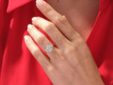 Diamond engagement ring on a hand, fine jewelry, luxury gift
