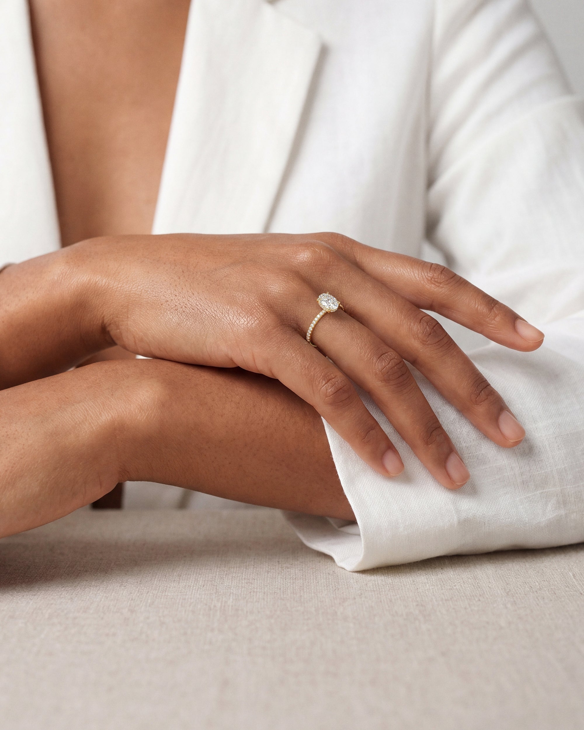 Hidden Halo Oval Moissanite Engagement Ring with Sidestones (1.50 CT)