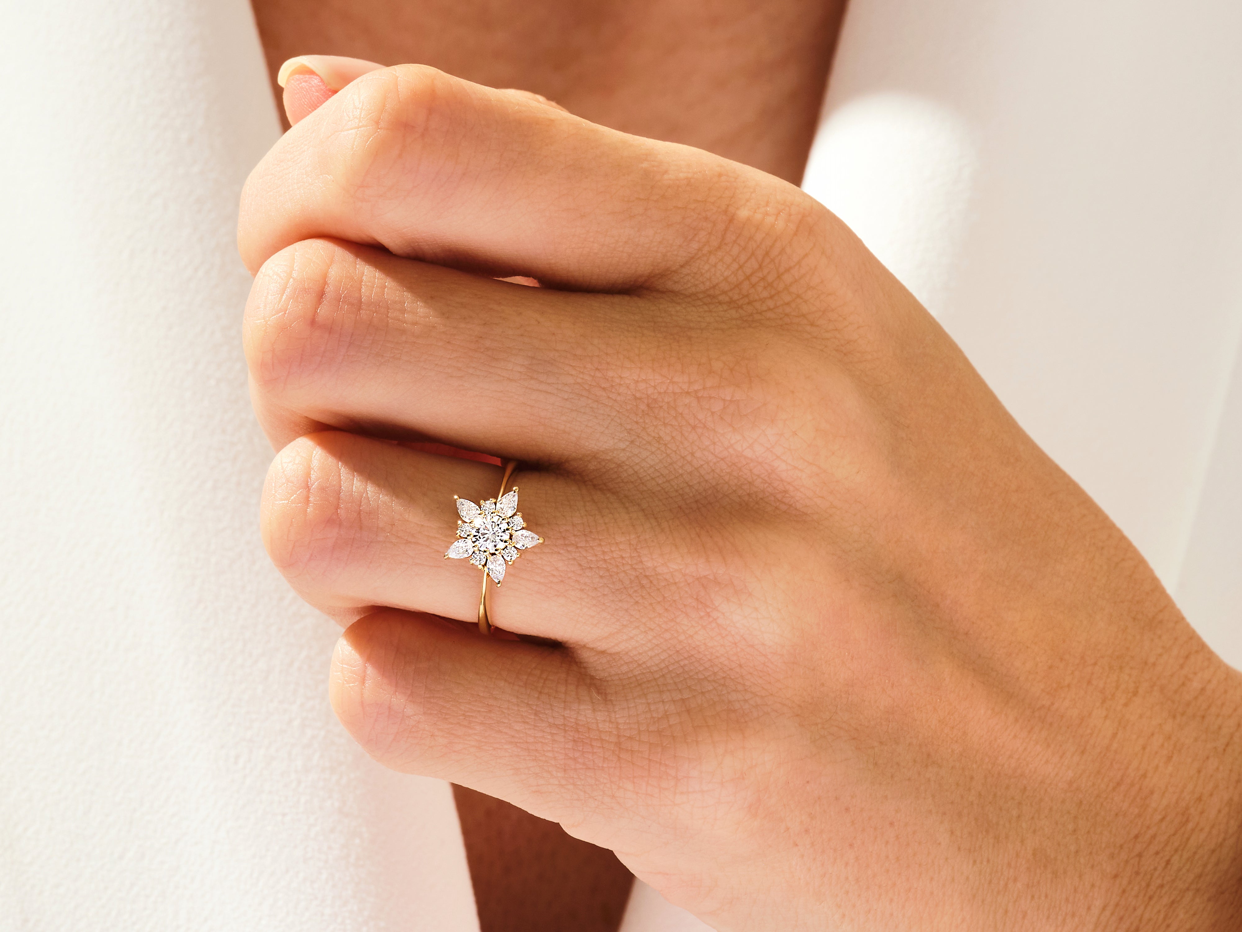 Diamond flower ring on hand, fine jewelry for women