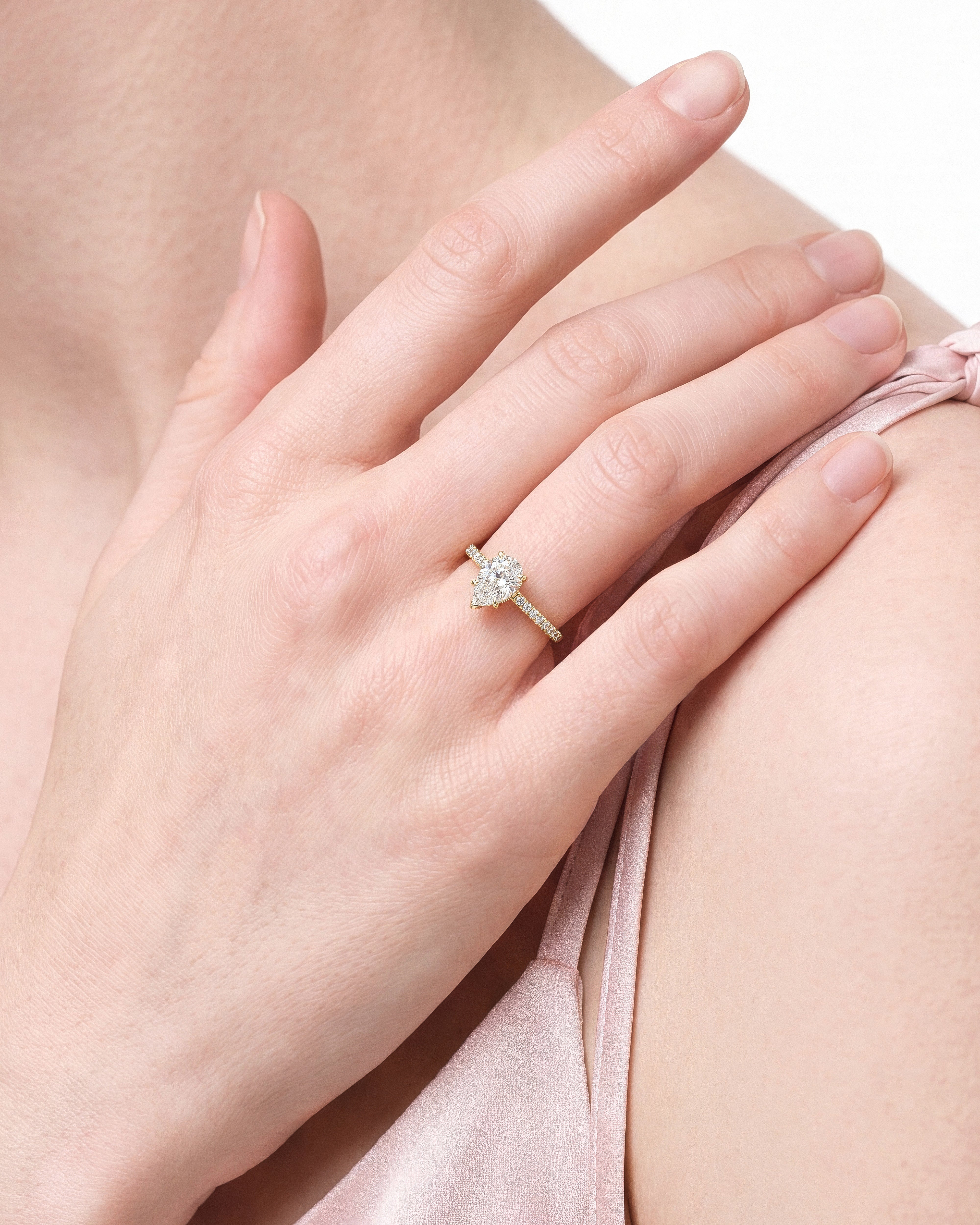 Pear Cut Moissanite Engagement Ring with Pave Set Side Stones (1.50 CT)