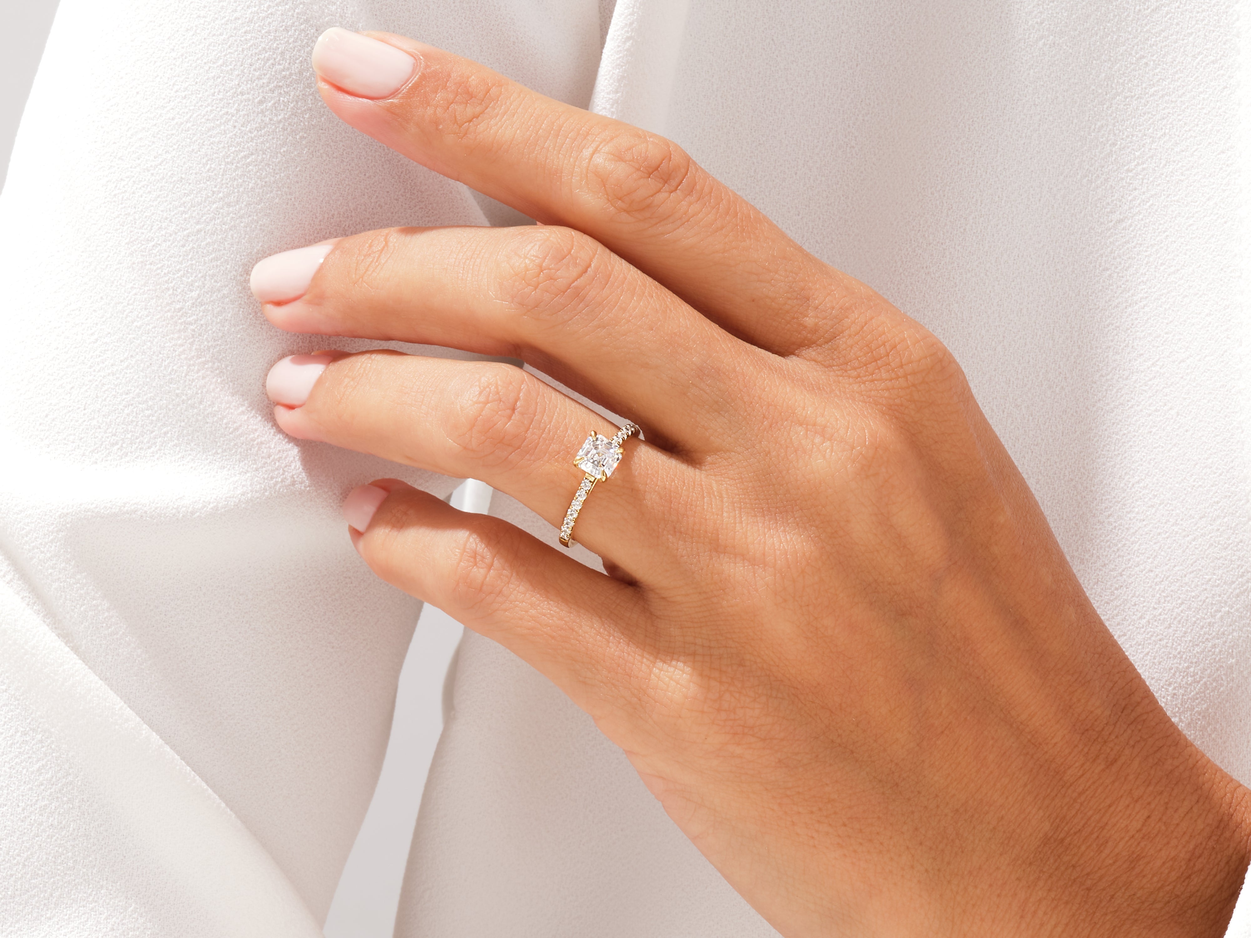Diamond engagement ring on a woman's hand