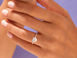 Heart-shaped diamond ring on a hand, luxury jewelry