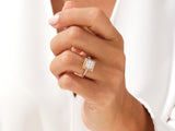 Diamond halo engagement ring on a woman's hand