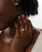 Oval Twisted Lab Grown Diamond Engagement Ring with Pave Set Side Stones (1.50 CT)
