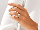 Princess cut diamond engagement ring on a woman's hand