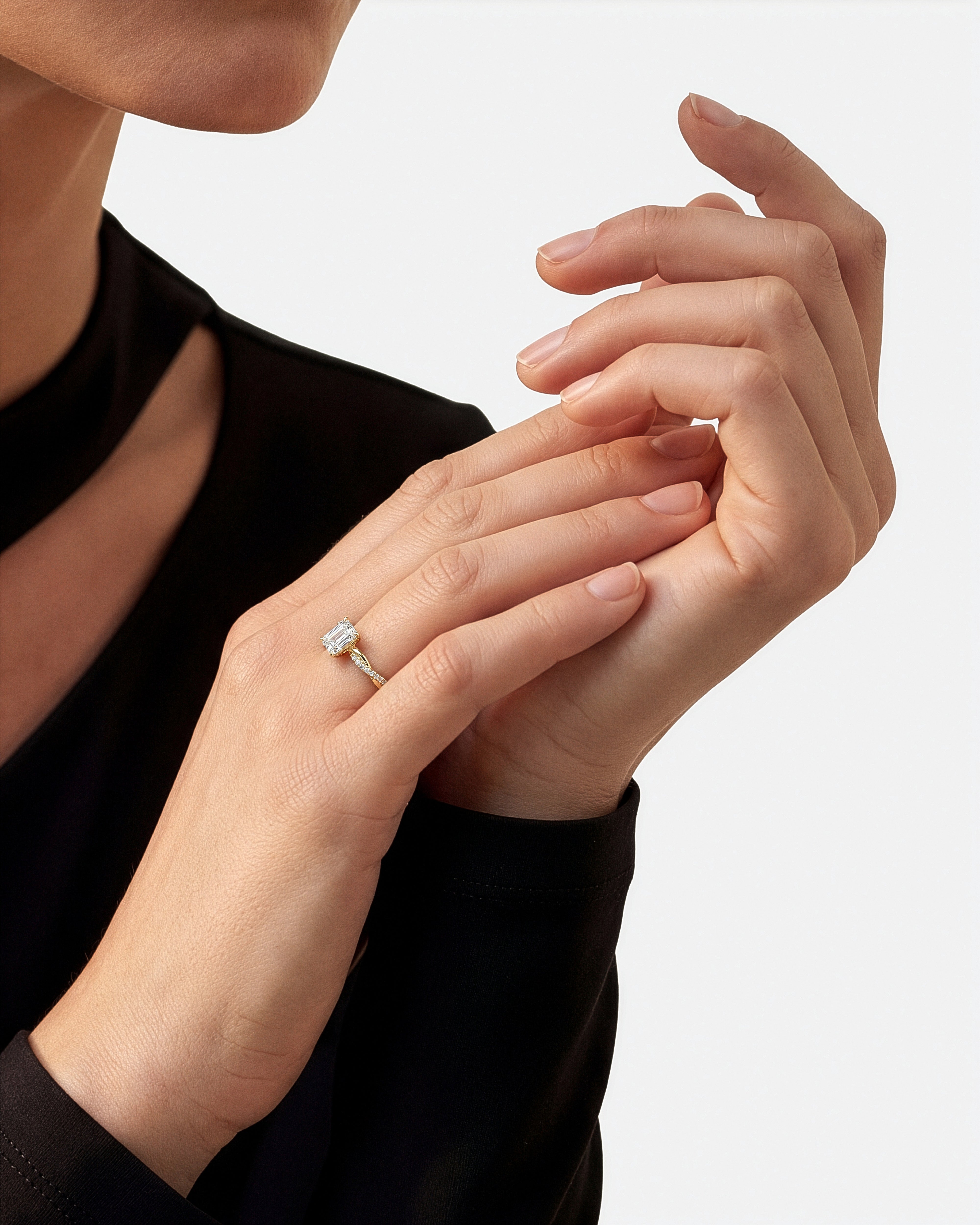 Emerald Twisted Moissanite Engagement Ring with Pave Set Side Stones (1.00 CT)