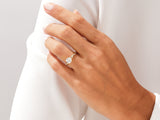 Diamond engagement ring on a woman's hand, jewelry firm product