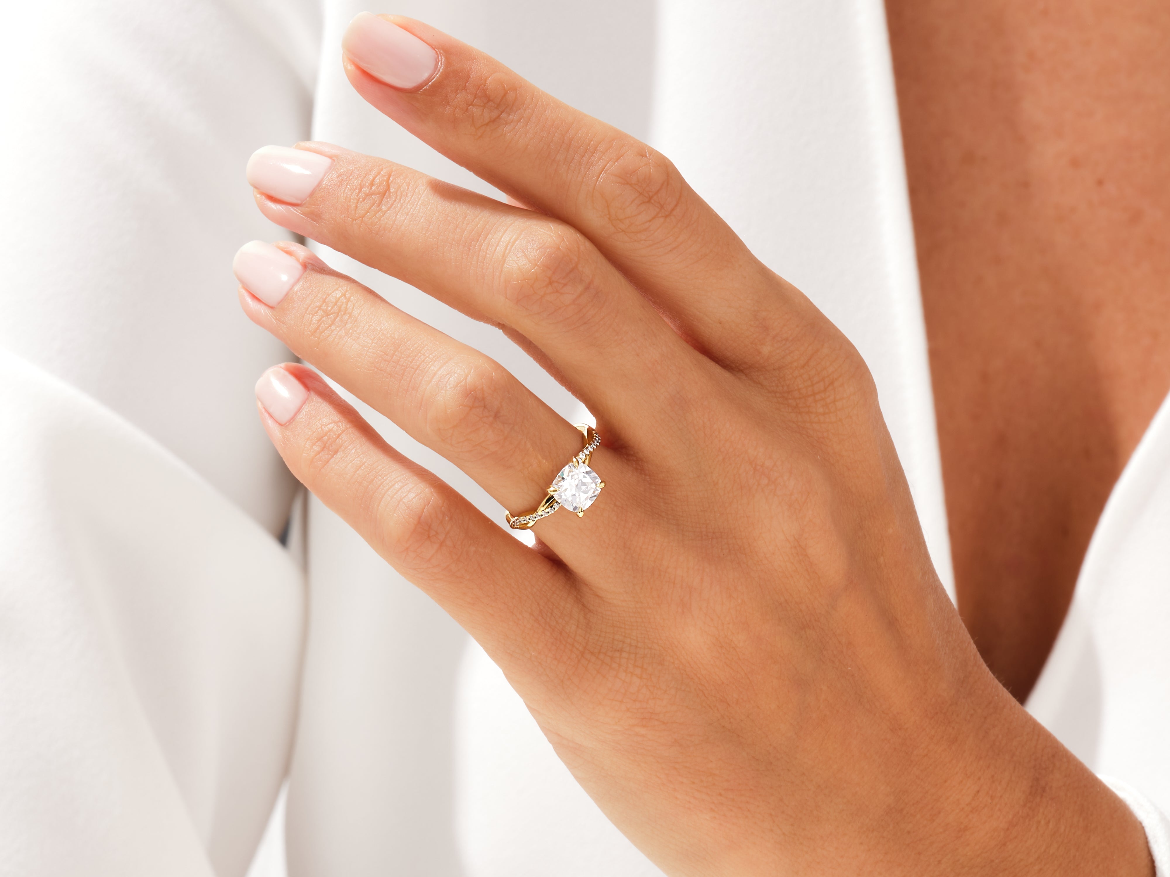 Diamond engagement ring on a woman's hand, jewelry
