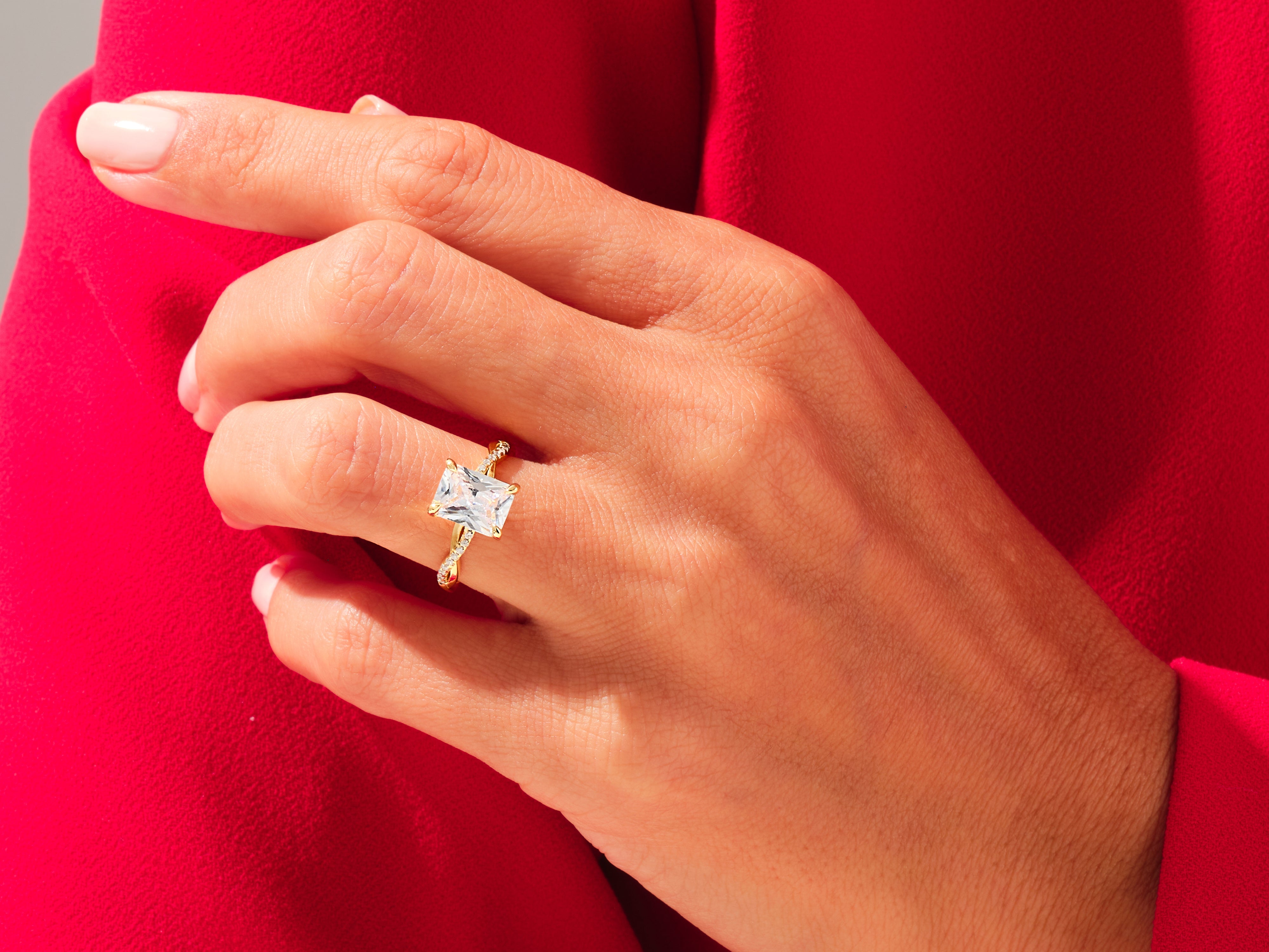 Gold diamond ring on hand, elegant jewelry for women