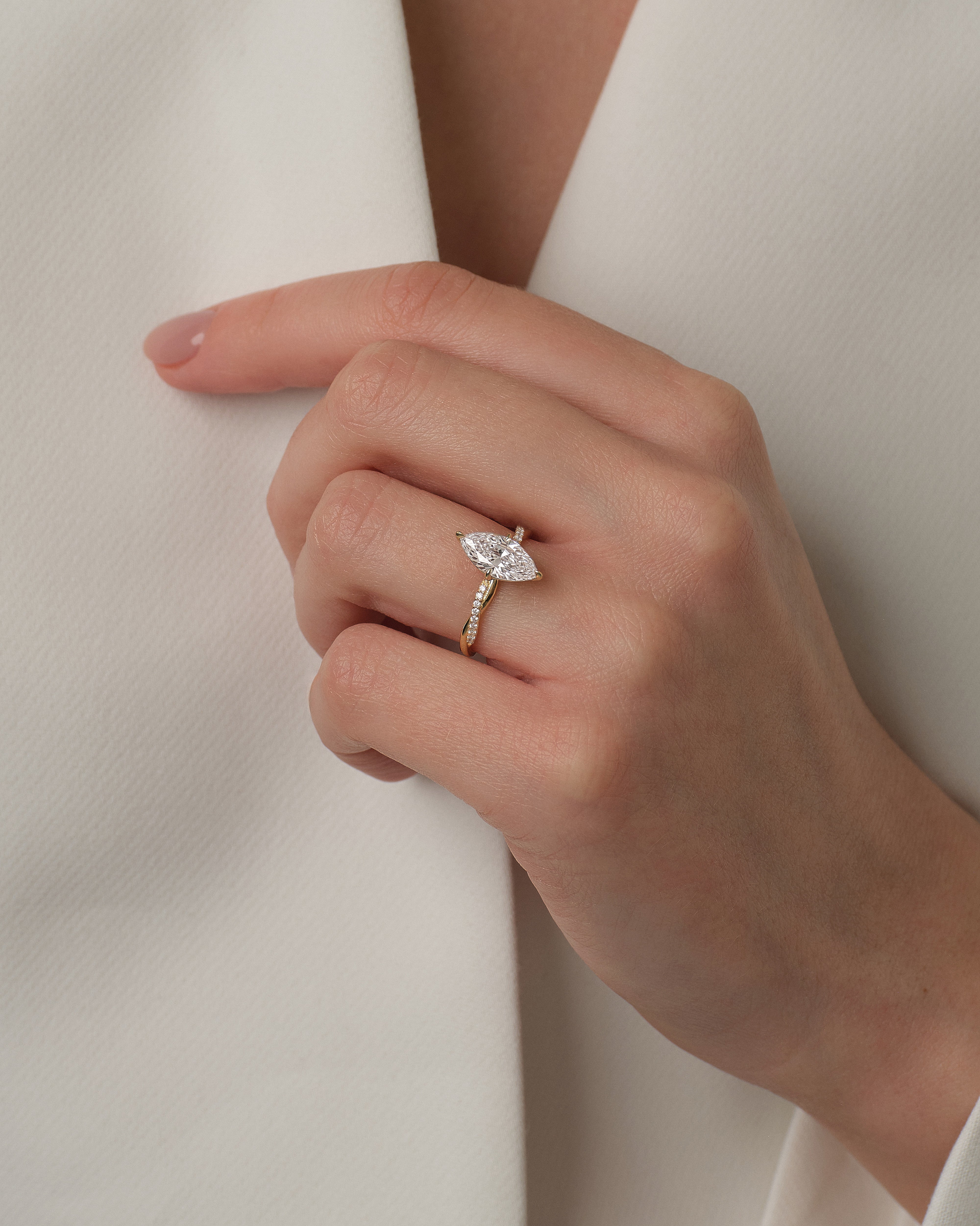 Marquise Twisted Moissanite Engagement Ring with Pave Set Side Stones (1.50 CT)