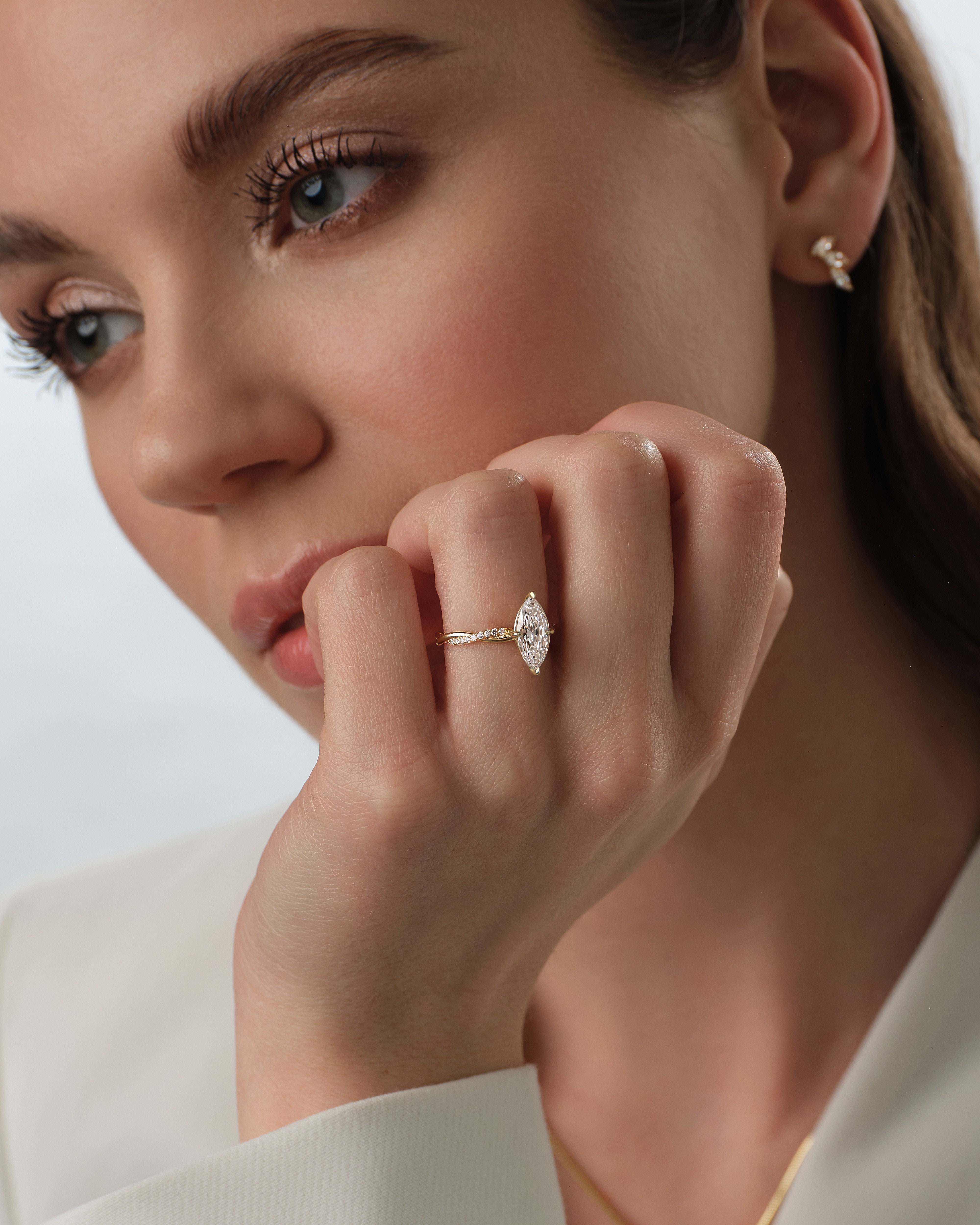 Marquise Twisted Moissanite Engagement Ring with Pave Set Side Stones (1.50 CT)