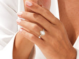 Pear-shaped diamond engagement ring with halo, fine jewelry