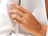 Emerald cut diamond ring on a hand, luxury jewelry