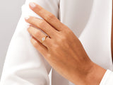 Gold diamond ring on a woman's hand, jewelry product photography