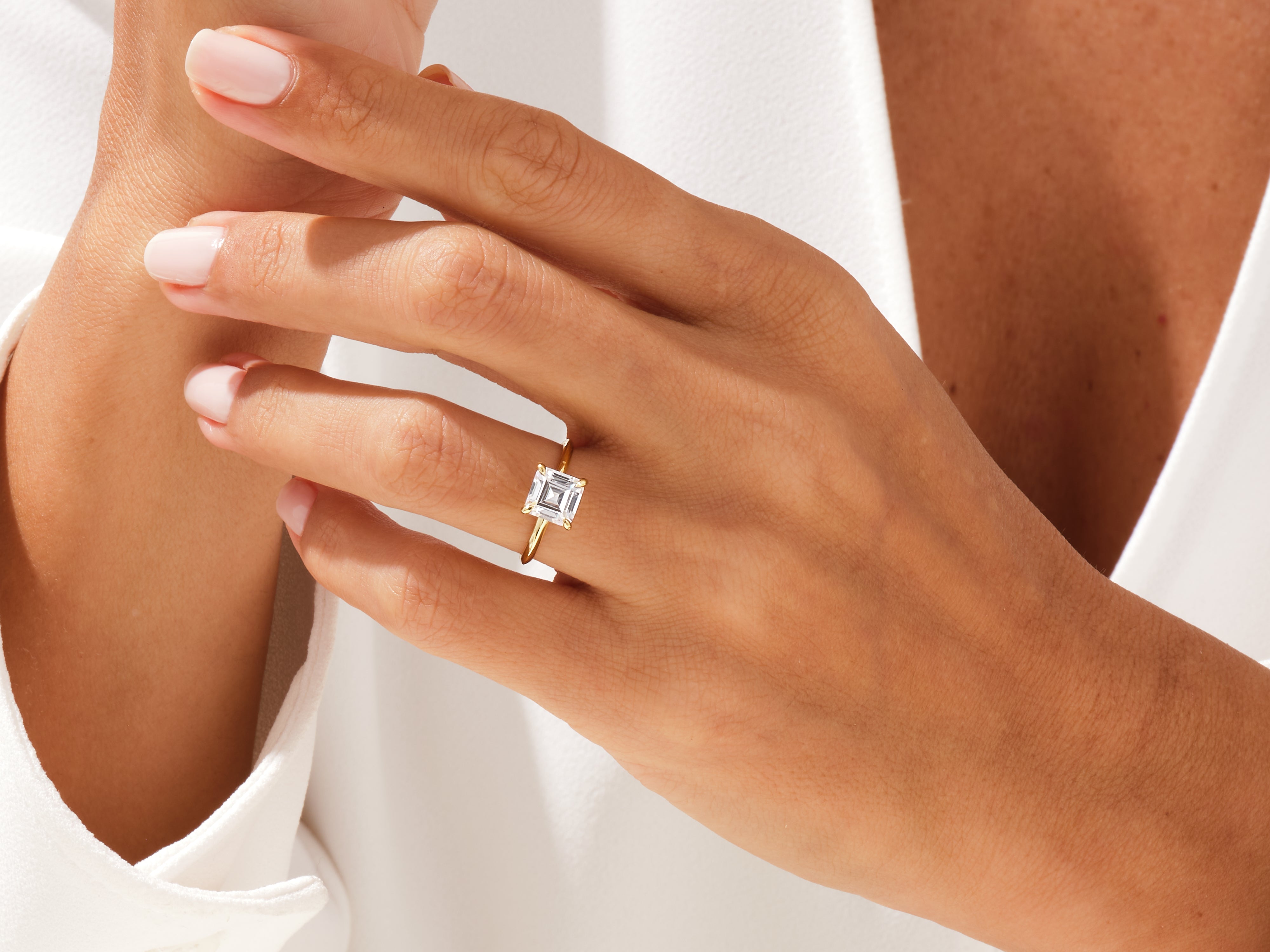 Diamond engagement ring on a woman's hand