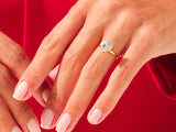 Heart-shaped diamond ring on a woman's hand, jewelry