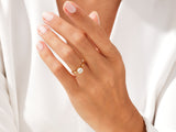 Gold ring with diamond on hand