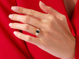 Elegant sapphire and diamond ring on a hand