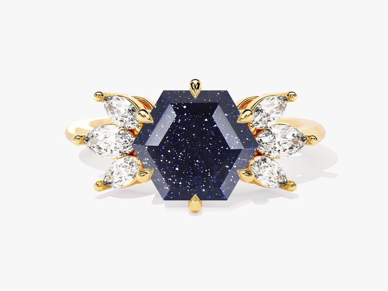 Gold ring with hexagonal blue stone and diamond accents