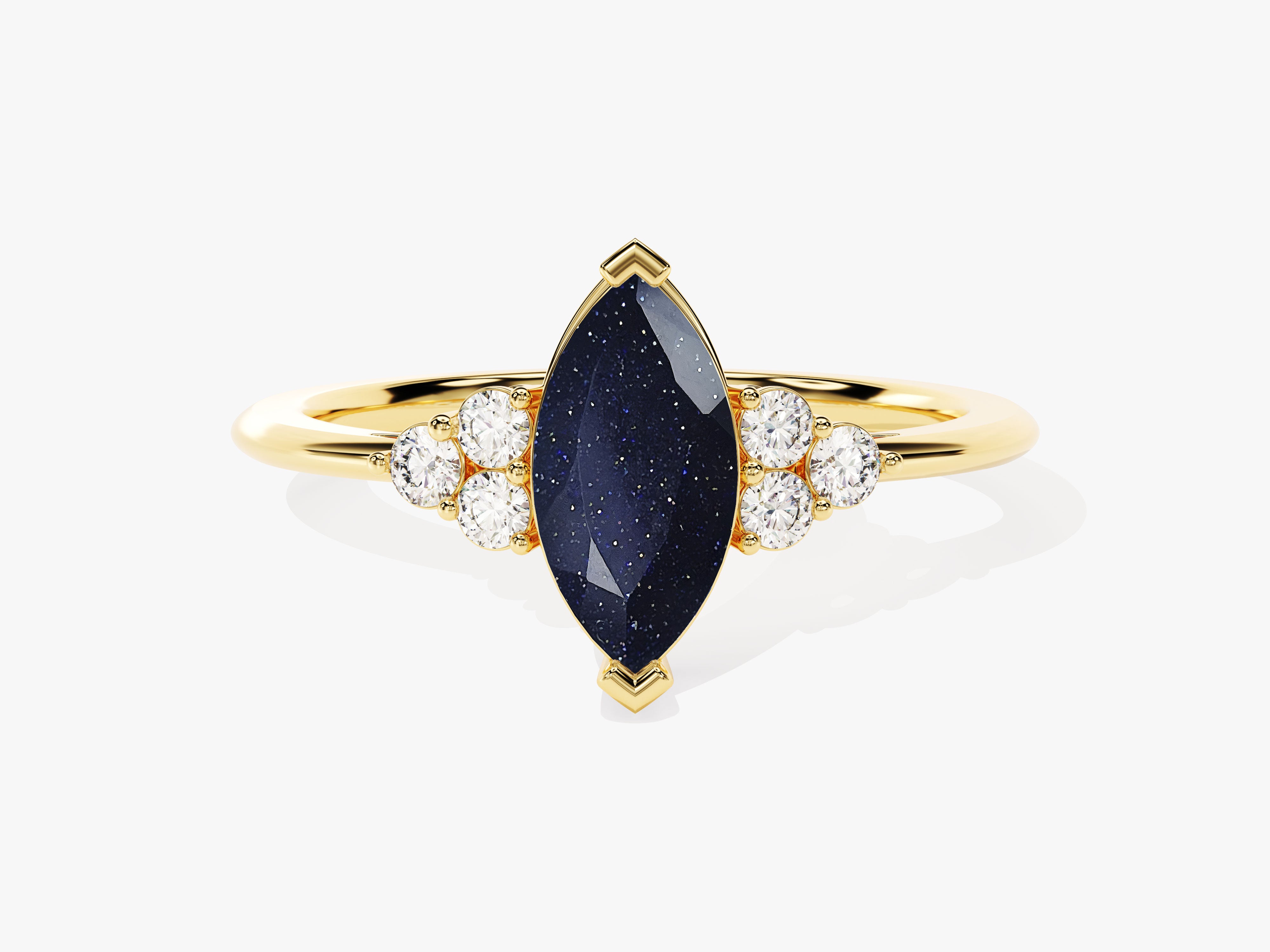 Gold ring with marquise blue sandstone and diamonds
