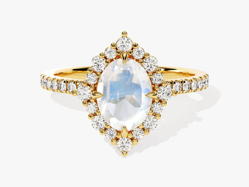 Gold marquise moonstone ring with diamond halo and band