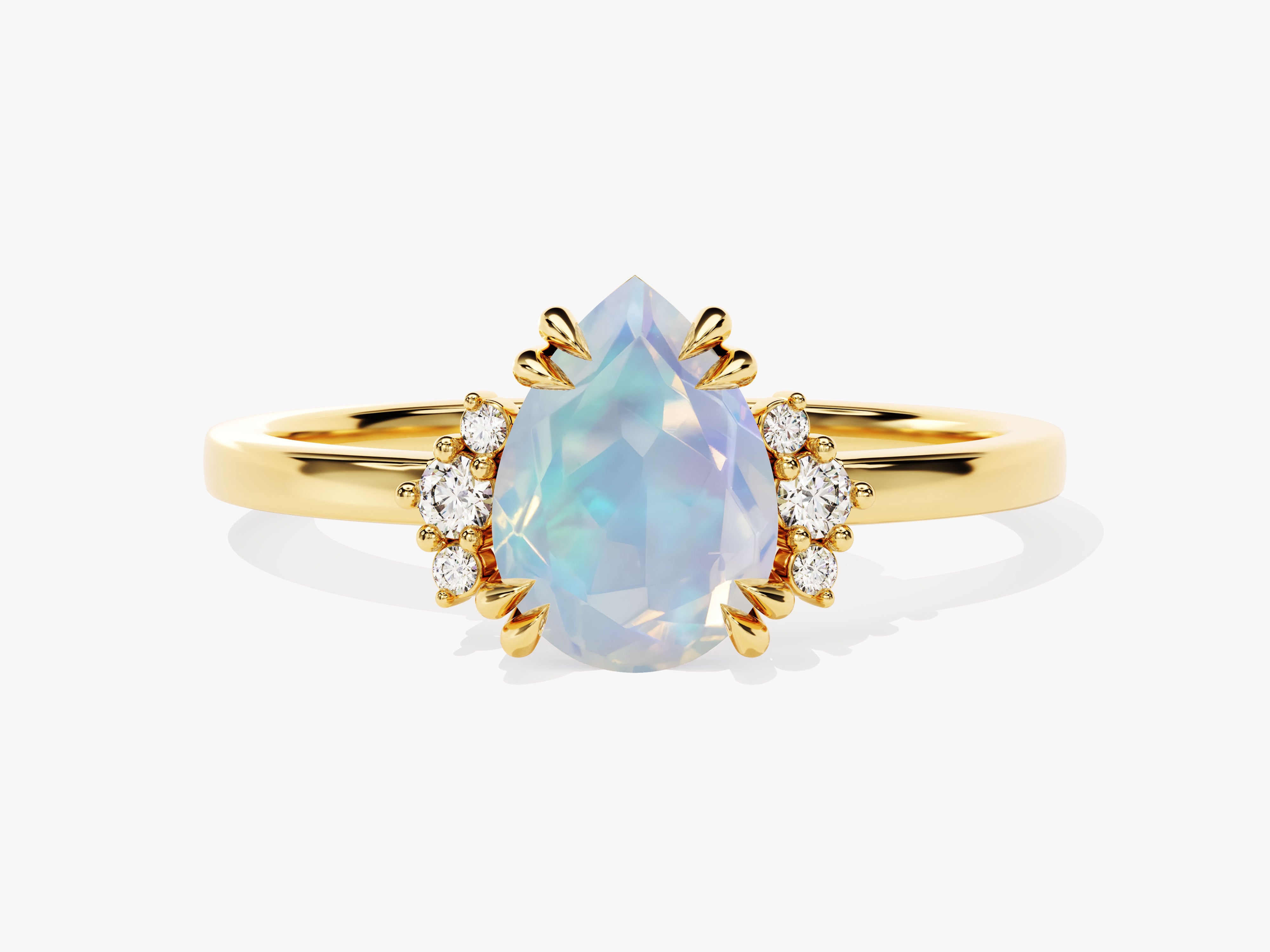 Gold ring with pear-shaped opal and diamond accents