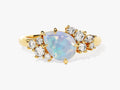 Pear Opal Engagement Ring with Round Moissanite Cluster