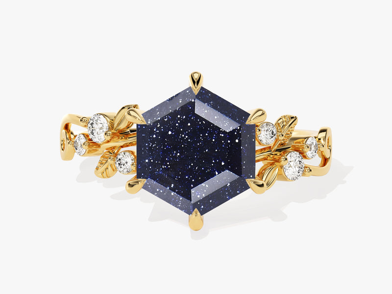 Gold ring with hexagonal blue stone and diamonds
