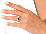 Unique gemstone ring on a hand, jewelry firm product