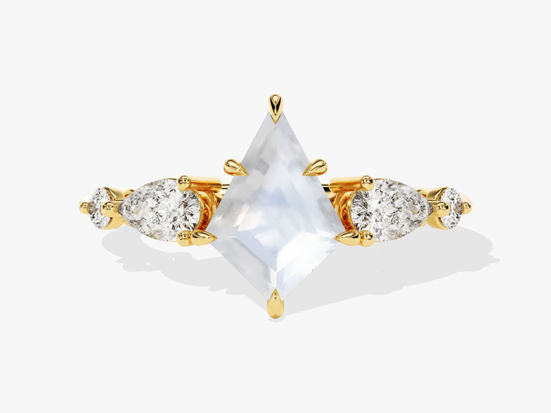 Gold ring with kite-cut diamond and pear-shaped diamonds