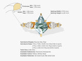 Kite and pear cut gemstone ring with diamond accents