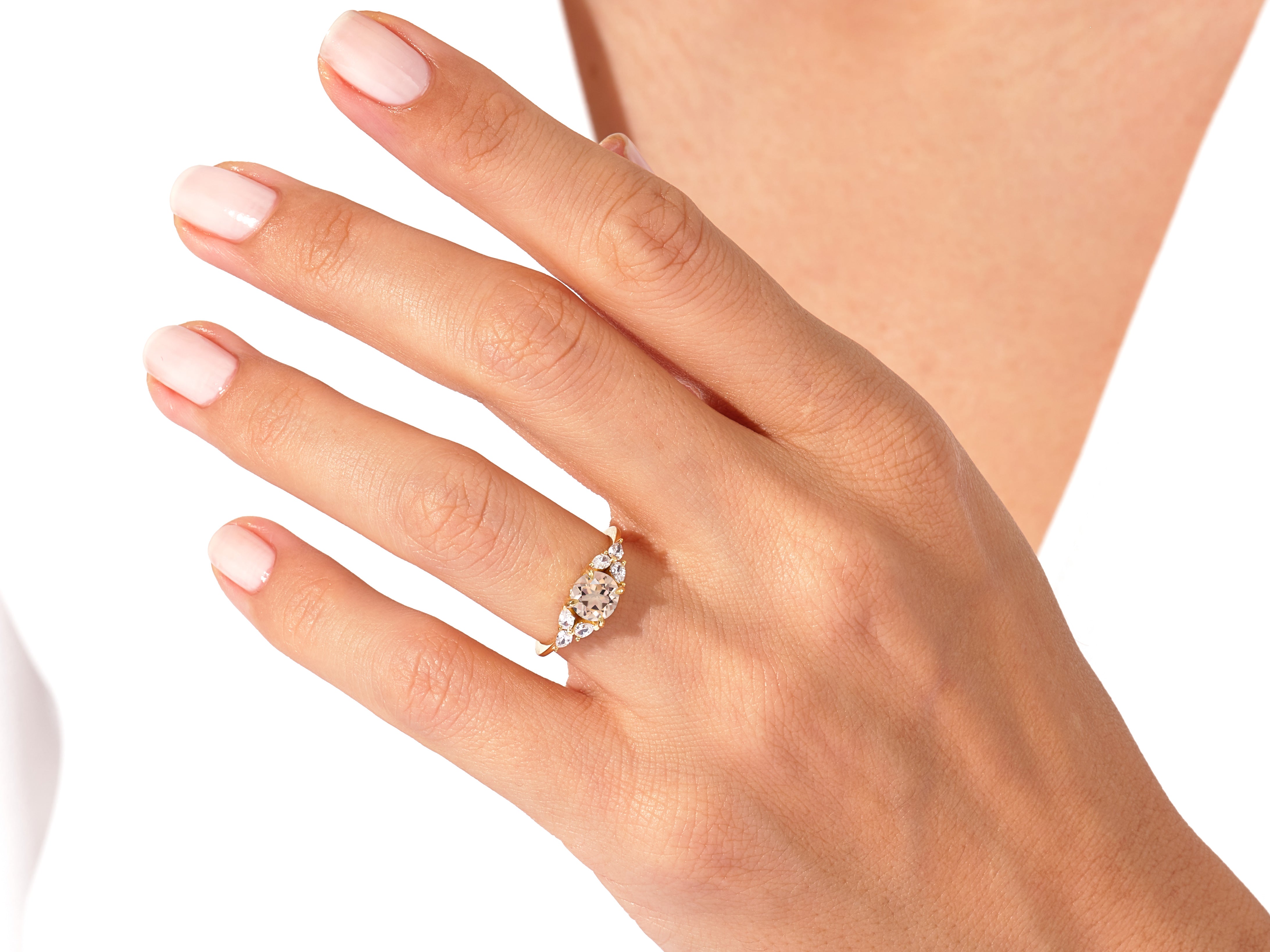 Gold ring with diamonds on a woman's hand