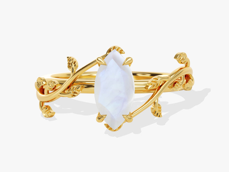 Gold marquise moonstone ring with vine leaf design