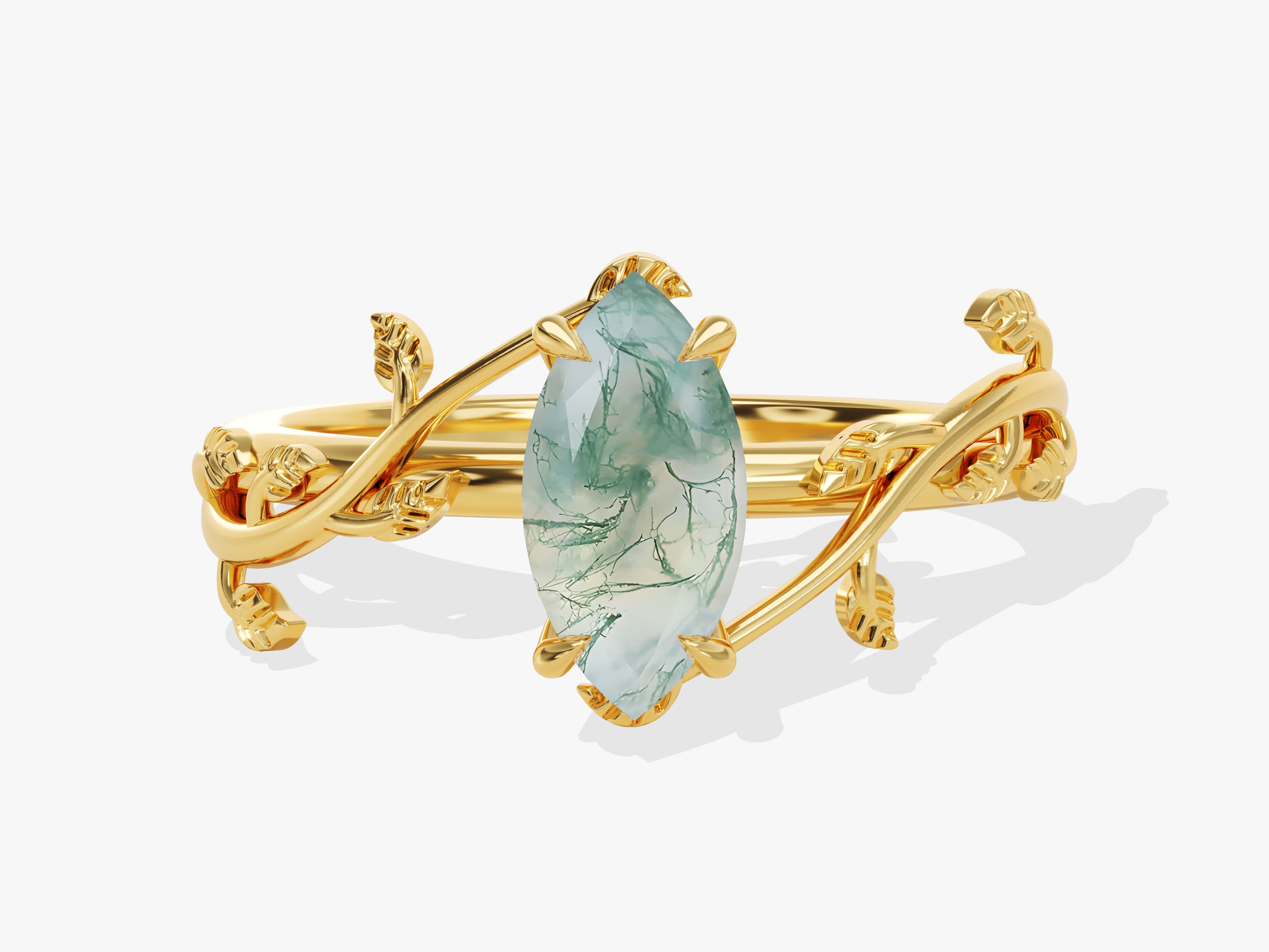 Gold ring with marquise moss agate gemstone and leaf design