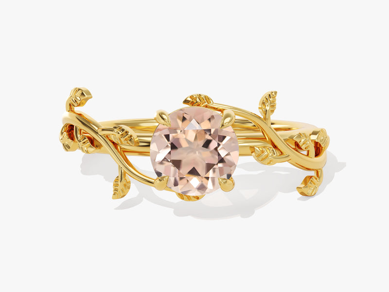 Gold ring with oval morganite and leaf design