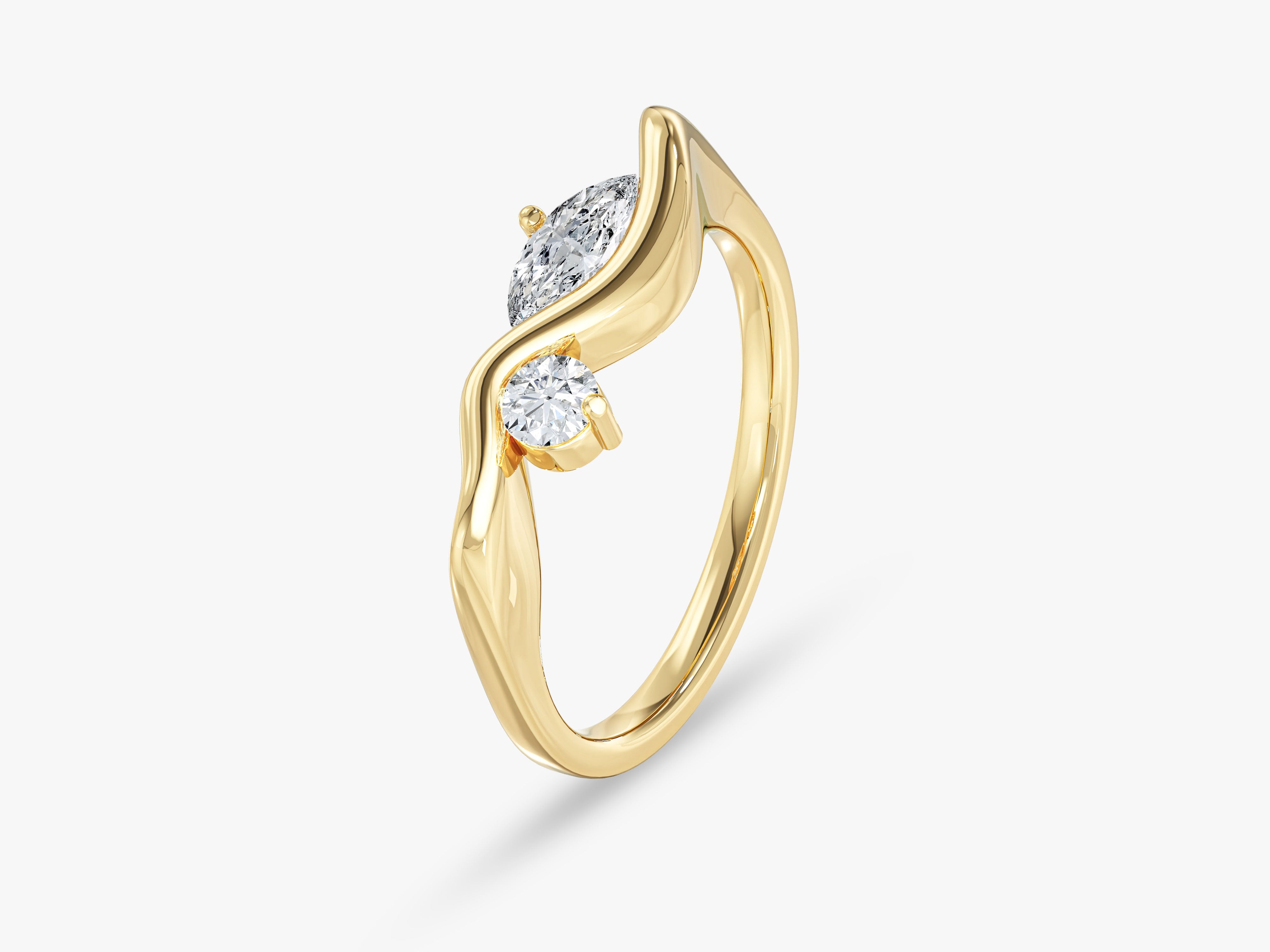 Gold ring with two diamonds, elegant jewelry design