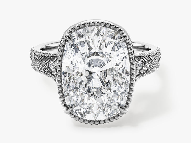 Oval diamond engagement ring with intricate band details