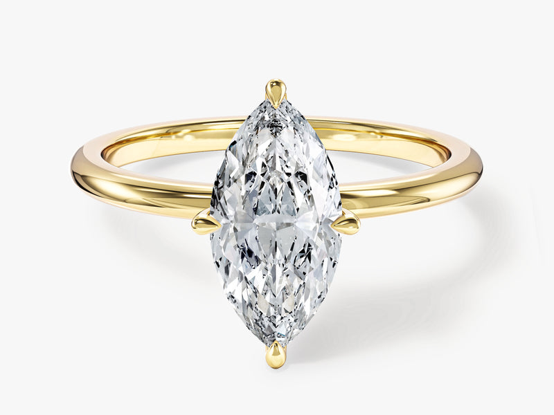 Marquise diamond engagement ring in yellow gold