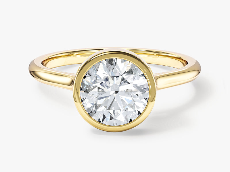 Gold bezel set diamond engagement ring from jewelry company