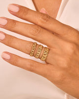 Gold chain rings stacked on a hand, jewelry for women